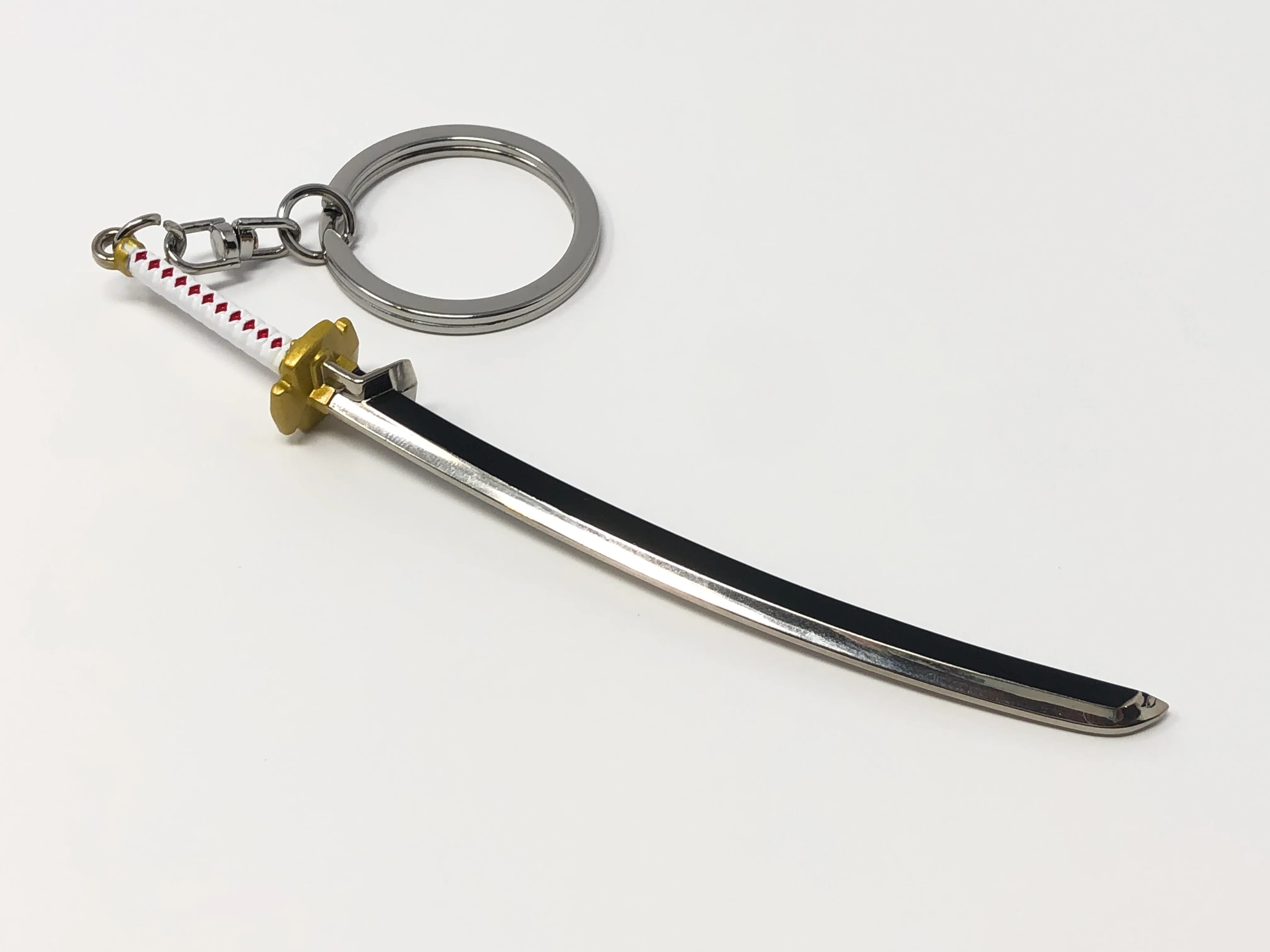 Guilty Gear -Strive- Nagoriyuki Vampiric Blade Metal Keychain - Image 3